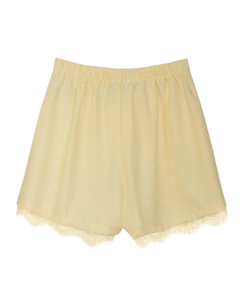 Skort mit asymmetrischem Saum und Spitzenbesatz